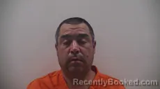 Mugshot of BENAVIDEZ CARLOS RENE booked in Cameron County, Texas on March 23, 2026