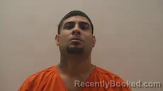 Mugshot of GARCES JOSHUA MOISES booked in Cameron County, Texas on March 27, 2026