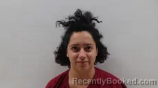 Mugshot of ALVARADO NAZARETH FAITH booked in Cameron County, Texas on May 10, 2026