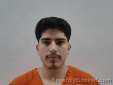 Mugshot of TURRUBIARTES DIEGO DAVID booked in Cameron County, Texas on May 13, 2026