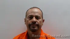 Mugshot of RIVERA ROCHA CANDELARIO booked in Cameron County, Texas on May 14, 2026