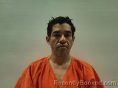 Mugshot of REINHARDT JUAN IVAN booked in Cameron County, Texas on May 28, 2026