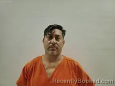 Mugshot of BECHO ALDO ADAN booked in Cameron County, Texas on July 14, 2026