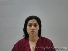 Mugshot of Escobedo Monica Isabel booked in Cameron County, Texas on September 9, 2026