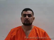 Mugshot of Toscano Enrique Lizandro booked in Cameron County, Texas on September 13, 2026