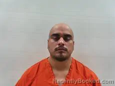 Mugshot of Lucio Adrian booked in Cameron County, Texas on September 13, 2026