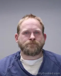 Mugshot of MATTHEW CHARLES POORMON