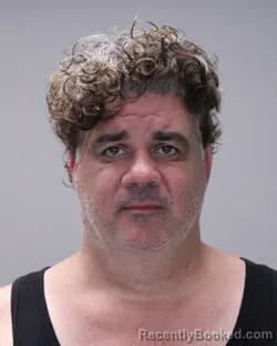 Mugshot of Charles Leonard Muscarella booked in Ontario County, New York on August 8, 2026