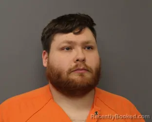 Mugshot of DEVON M MALONE booked in Orleans County, New York on March 20, 2026