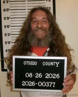Mugshot of George A Knarich booked in Otsego County, New York on August 26, 2026