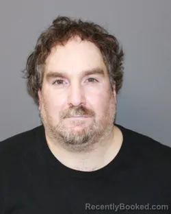 Mugshot of JOHN E STARK booked in St Lawrence County, New York on April 14, 2026