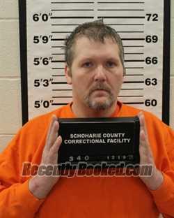 Booking photo from Schoharie County, New York