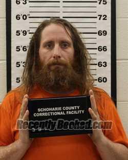 Booking photo from Schoharie County, New York