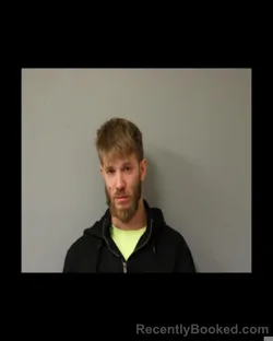 Mugshot of JORDAN L BURKHART