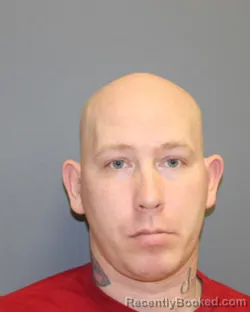 Mugshot of JUSTIN E HELMICK