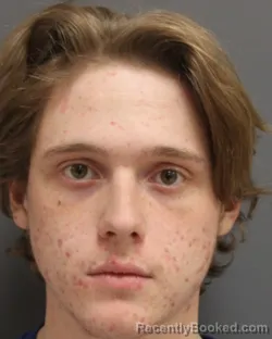 Mugshot of JUSTIN N SECORE