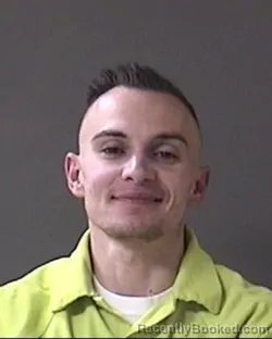 Mugshot of Andrew E Hughes