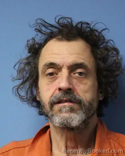 Mugshot of MERLE B ADAMS