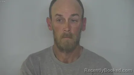 Mugshot of JUSTIN WILLIAM DOWNING booked in Burleigh County, North Dakota on June 26, 2026