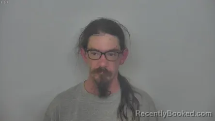 Mugshot of JUSTIN KAHL SIMS booked in Burleigh County, North Dakota on May 13, 2026