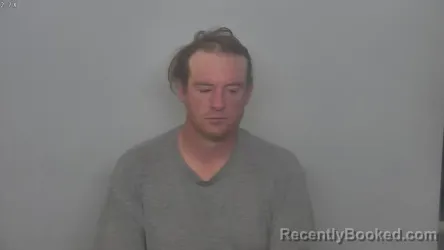 Mugshot of Justin Gerald Waltos booked in Burleigh County, North Dakota on September 11, 2026