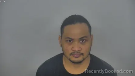 Mugshot of MY ASIMIRO booked in Burleigh County, North Dakota on March 24, 2026