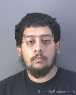 Mugshot of ROGELIO ULISES SERRANO booked in Hendry County, Florida on April 24, 2026