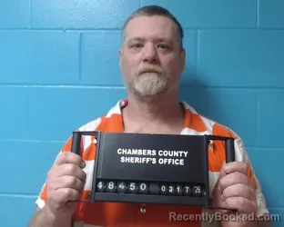 Mugshot of David Joseph Moore booked in Chambers County, Texas on March 17, 2026