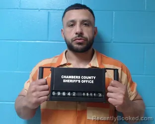 Mugshot of Xavier Daniel Reyes booked in Chambers County, Texas on May 11, 2026