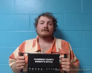 Mugshot of Ashton Ray Hogan booked in Chambers County, Texas on July 14, 2026
