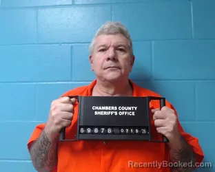Mugshot of Travis Clint Coates booked in Chambers County, Texas on July 15, 2026