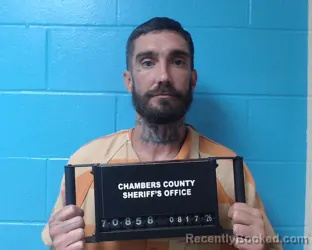 Mugshot of Travis Lee Belvin booked in Chambers County, Texas on August 17, 2026