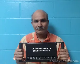 Mugshot of Sikander B Surani booked in Chambers County, Texas on March 19, 2026