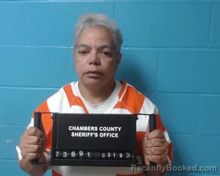 Mugshot of Carmen Milagros Figueroa booked in Chambers County, Texas on March 19, 2026