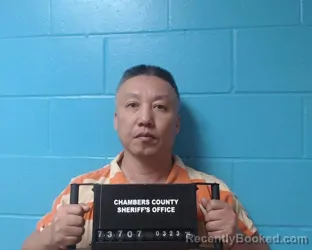 Mugshot of Tuan Hoang Lam booked in Chambers County, Texas on March 23, 2026