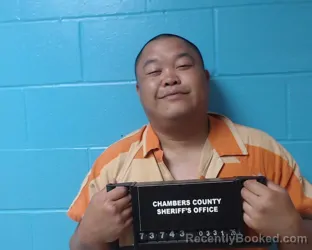 Mugshot of Vu Thanh Tran booked in Chambers County, Texas on March 31, 2026