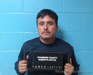 Mugshot of Miguel Angel Flores-Bentacourt booked in Chambers County, Texas on May 7, 2026