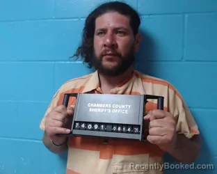 Mugshot of Jose Mendoza-Gonzalez booked in Chambers County, Texas on June 14, 2026
