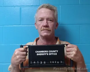 Mugshot of Garrett Todd Adams booked in Chambers County, Texas on June 26, 2026