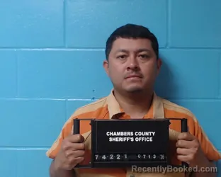 Mugshot of Mario Alberto Herrera Montes booked in Chambers County, Texas on July 13, 2026