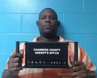 Mugshot of Challis Orlando Simms booked in Chambers County, Texas on August 21, 2026