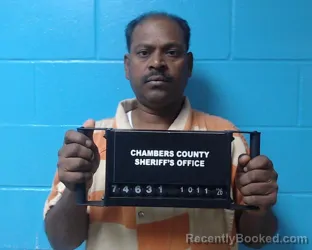 Mugshot of Biju John booked in Chambers County, Texas on October 11, 2026