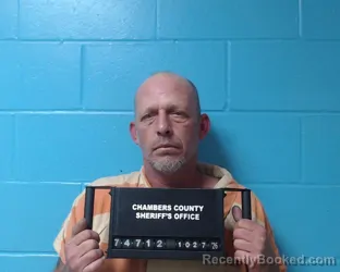 Mugshot of Ronny J Hutchinson booked in Chambers County, Texas on October 27, 2026