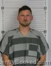 Mugshot of AARON JOHN DELVO booked in Williams County, North Dakota on June 27, 2026