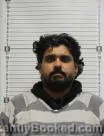 Mugshot of Areeb Fazal Elahi Malik booked in Williams County, North Dakota on August 30, 2026