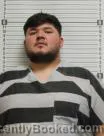 Mugshot of Ethan Lee Baker booked in Williams County, North Dakota on August 9, 2026