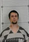 Mugshot of KIEL ALOYUIS AZURE booked in Williams County, North Dakota on July 9, 2026