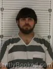 Mugshot of TYLER AUBRY MCKOON booked in Williams County, North Dakota on May 12, 2026