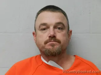 Mugshot of Brandon Lee Hughes booked in Beckham County, Oklahoma on August 14, 2026
