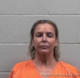 Mugshot of CHRISTI JEAN EVANS booked in Blaine County, Oklahoma on March 26, 2026